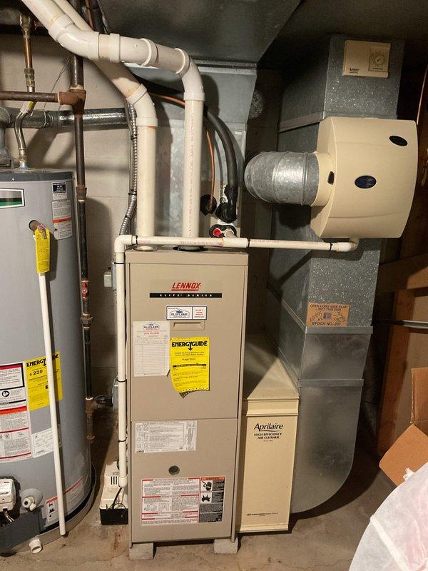 Responded to recall for 20-year-old residential air conditioning system experiencing icing issues and failure to operate. Upon inspection, evaluated both the outdoor condensing unit and indoor Lennox furnace system. Assessed refrigerant pressures, electrical connections at disconnect box, and overall system operation. Provided estimate for complete HVAC system replacement due to age of equipment and recurring operational failures affecting whole-home comfort.