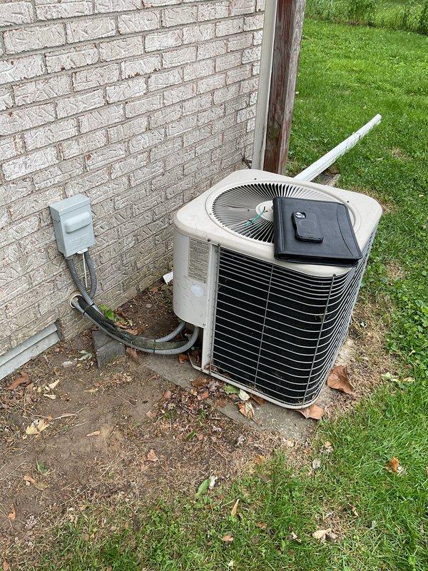 Responded to recall for 20-year-old residential air conditioning system experiencing icing issues and failure to operate. Upon inspection, evaluated both the outdoor condensing unit and indoor Lennox furnace system. Assessed refrigerant pressures, electrical connections at disconnect box, and overall system operation. Provided estimate for complete HVAC system replacement due to age of equipment and recurring operational failures affecting whole-home comfort.