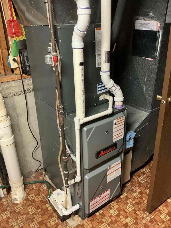 Responded to callback for A/C short cycling issue following previous service visit. Upon arrival, performed system diagnostics revealing temperature split of 20 degrees (72°F return to 52°F supply). Observed severely dirty 20x25x5 air filter requiring replacement. Verified condensate pump operation with 10-second run cycle functioning properly. Measured condenser amperage at 0.45/5.63 amps with 4.88 amp startup, within normal parameters.

Identified low refrigerant pressure indicating potential system leak. Conducted comprehensive refrigerant leak search using electronic leak detector, ultrasonic equipment, and soap bubble testing methods. Inspected both indoor evaporator coil assembly and outdoor condenser unit thoroughly. No active leaks detected during inspection. Noted possible leak source from schrader core that was tightened during previous visit, or potential leak on inaccessible back side of evaporator coil.

Recorded ambient conditions: outdoor dry bulb temperature 70°F, wet b