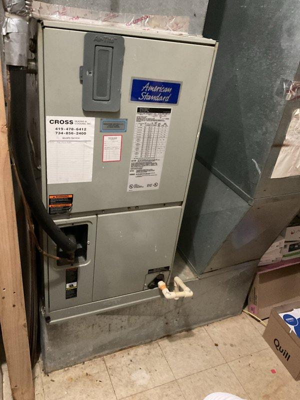 Conducted commercial AC replacement estimate for office space. Evaluated existing American Standard HVAC unit in basement utility area and assessed electrical panel with 60-amp breakers and foam weatherproofing. Documented equipment specifications, electrical infrastructure, and ductwork configuration to prepare comprehensive replacement proposal.