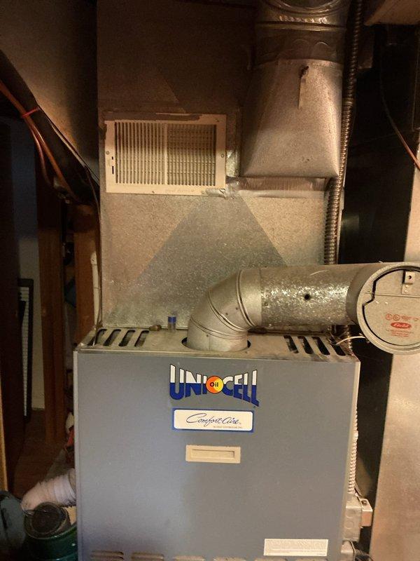 Responded to no cooling complaint on 20-year-old residential air conditioning system. Upon arrival, confirmed unit was running continuously with minimal cooling output affecting entire home. Performed comprehensive system evaluation including refrigerant charge verification, airflow measurements, and electrical diagnostics. Found system operating with significantly reduced capacity due to age-related component degradation. Compressor amperage readings indicated decreased efficiency, and condenser coil showed signs of internal restrictions despite external cleaning. Indoor evaporator coil airflow was adequate through Unicell furnace system. Given the unit's age at 20 years—well beyond typical 15-year service life—and the extent of wear on major components, recommended system replacement rather than repair. Discussed options with homeowner regarding new high-efficiency equipment that would provide reliable cooling and reduced operating costs. Unit currently operational but unable to meet