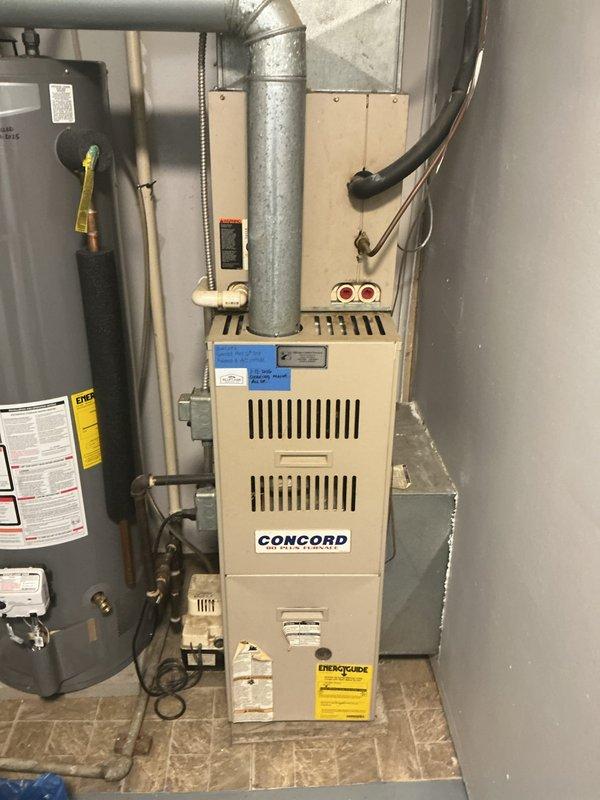Completed MVP cooling maintenance on residential HVAC system over 20 years old. Performed comprehensive inspection of Concord furnace unit and outdoor condenser unit, verified refrigerant lines and connections, and confirmed all components operational. System serviced and ready for continued use.