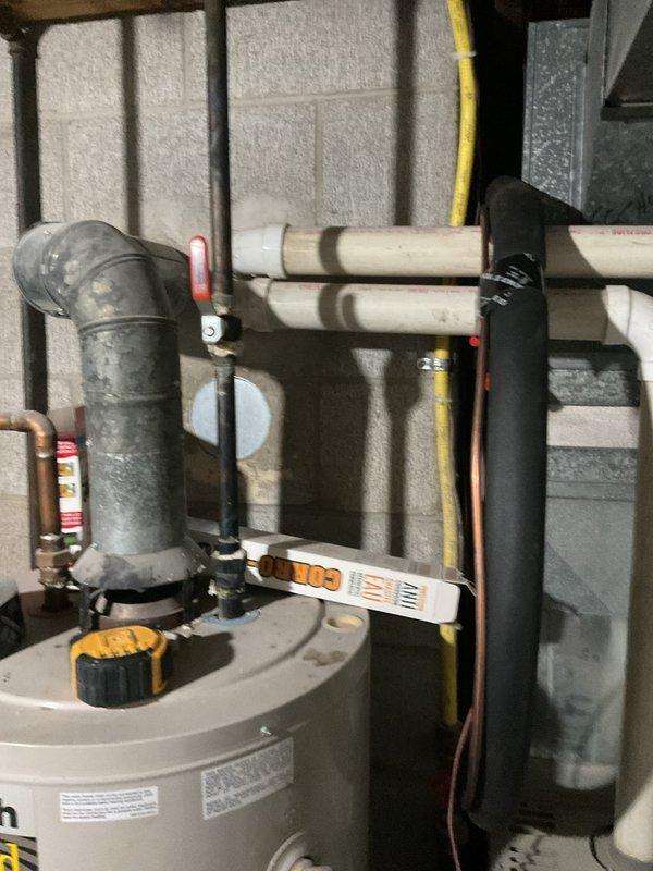 Completed comprehensive estimate for replacement of two furnaces and one air conditioning system. Evaluated existing Trane furnace installation in basement utility room, including ductwork configuration, venting systems, condensate drainage, and electrical connections. Assessed water heater proximity and clearance requirements for proper equipment spacing and code compliance. Photographed current equipment layout, piping arrangements, and mechanical room conditions to develop accurate replacement specifications and installation plan.