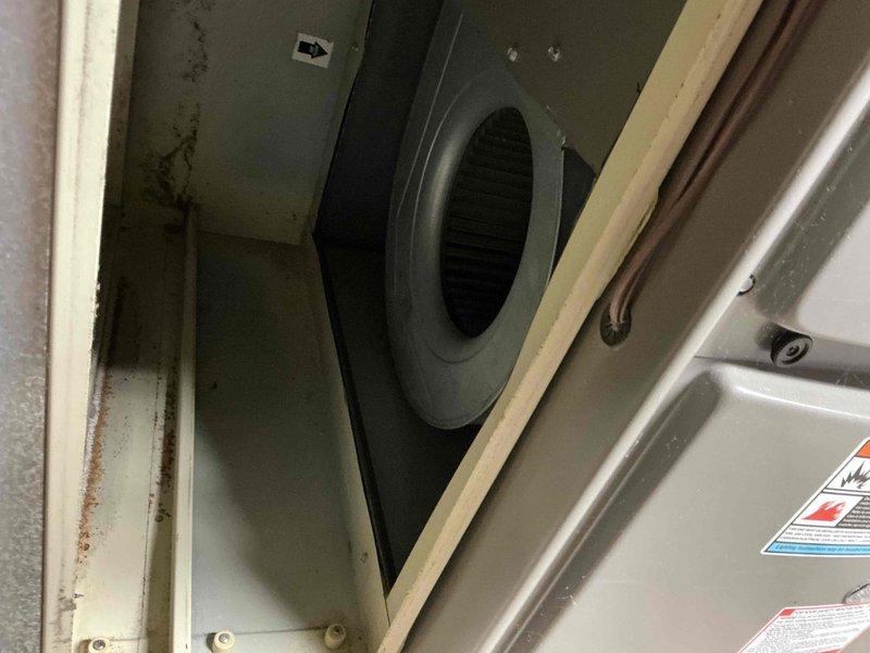 Completed MVP air conditioning tune-up on 10-year-old outdoor unit. Appointment was rescheduled as customer had another A/C installation in progress at a different property. System inspection included evaluation of indoor air handler components and Aprilaire humidifier attachment with visible dust accumulation typical of basement installations.