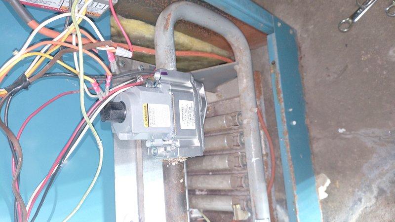 Responded to service call regarding boiler tagged by another contractor for suspected gas leak and insufficient gas consumption. Upon arrival, performed visual inspection of gas valve assembly, burner components, and control wiring. Documented existing equipment condition including gas control valve, burner manifold assembly, and associated piping. Customer indicated they would schedule follow-up visit when additional household member could be present for complete diagnostic evaluation and any necessary repairs.