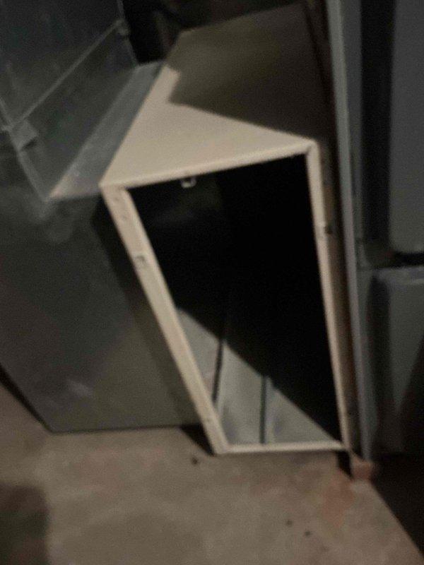 Responded to no cooling call affecting entire home. Upon arrival, performed system diagnostics and inspection of HVAC components including air handler and ductwork. Examined Aprilaire Model 2200 Media Air Cleaner installation and verified proper airflow through supply plenum. Documented system configuration with photos of ductwork and filtration components for service records.