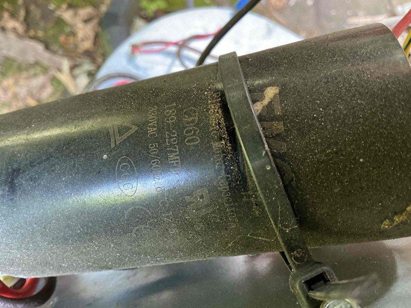 Completed seasonal cooling maintenance on outdoor condensing unit aged 10-15 years. Performed comprehensive system inspection including electrical components, capacitor, contactor, and compressor connections. All components found operating within normal parameters with typical accumulation of outdoor debris and surface contamination noted on refrigerant lines and exterior casing.