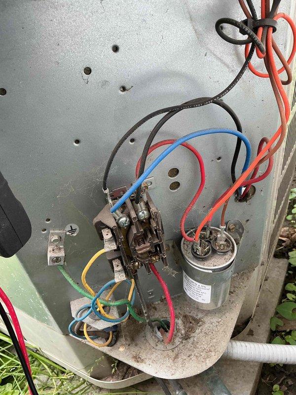 Responded to no-cooling complaint with condenser fan not operating. Performed diagnostic inspection of outdoor unit and electrical components. Identified failed dual run capacitor preventing compressor and condenser fan motor operation. Replaced defective capacitor with proper OEM replacement, verified all electrical connections secure, and tested system operation. Unit cooling properly with condenser fan running at correct speed upon departure.