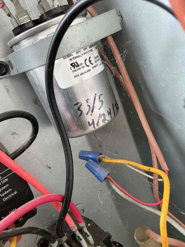 Completed comprehensive cooling maintenance on 13-year-old Amana air conditioning system. Performed standard tune-up procedures including inspection of electrical components, capacitor testing, refrigerant line examination, and verification of unit operation. All components found in serviceable condition with proper connections maintained throughout the system.