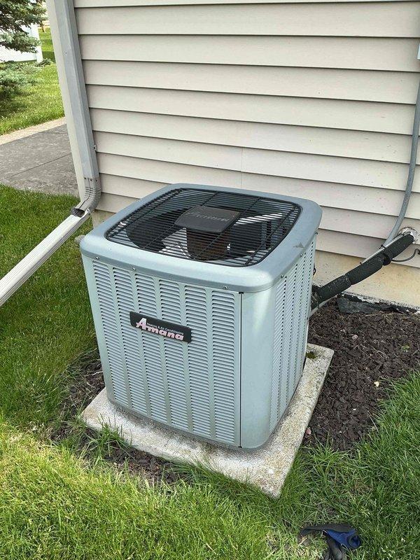 Completed comprehensive cooling maintenance on 13-year-old Amana air conditioning system. Performed standard tune-up procedures including inspection of electrical components, capacitor testing, refrigerant line examination, and verification of unit operation. All components found in serviceable condition with proper connections maintained throughout the system.