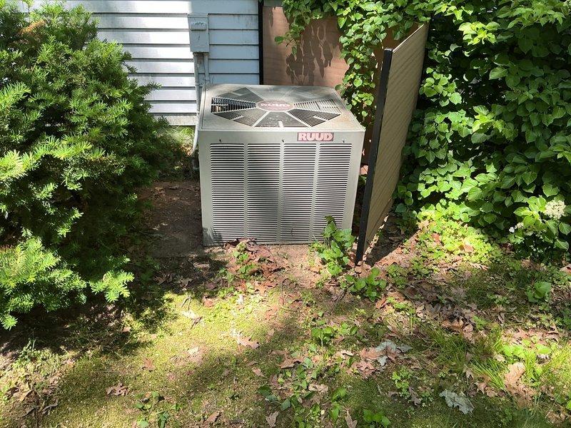 Completed annual air conditioning tune-up and preventive maintenance on RUUD outdoor condensing unit over 15 years old. Performed comprehensive system inspection, cleaned condenser coils, checked refrigerant levels, tested electrical components, and verified proper system operation to ensure optimal cooling performance for the upcoming season.
