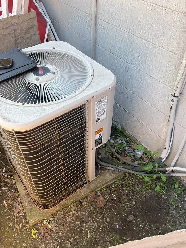 Conducted comprehensive site evaluation for complete HVAC system replacement at commercial facility. Assessed existing outdoor condensing units showing significant age-related deterioration, including weathered components, discolored housings, and compromised efficiency. Documented current equipment specifications, electrical infrastructure including conduit routing and panel locations, and installation constraints in exterior service area. Evaluated mounting pad conditions, clearance requirements, and accessibility for future maintenance. Prepared detailed estimate for replacement of both furnace and air conditioning systems to restore optimal climate control performance and energy efficiency to the facility.