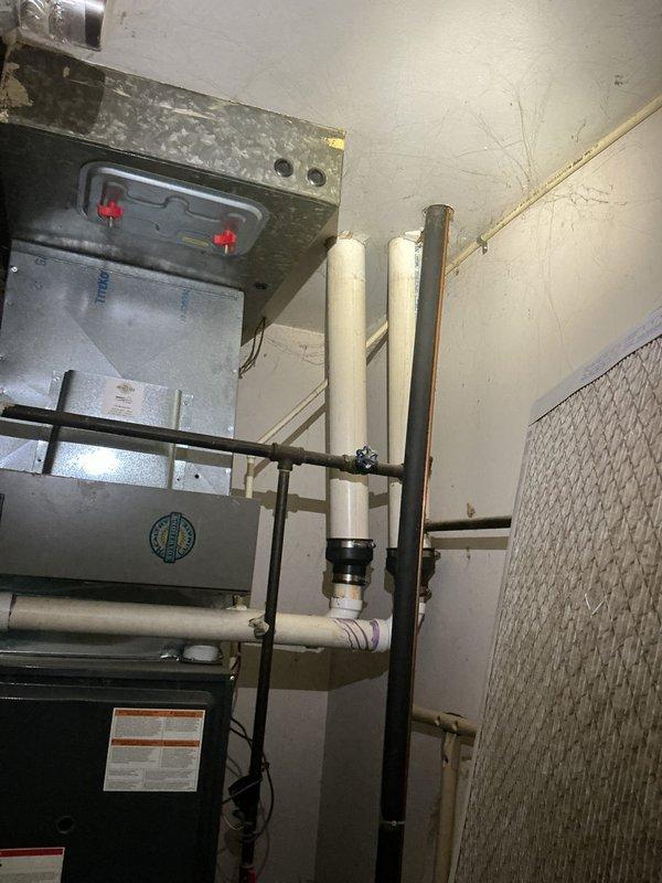 # HVAC Service - A/C Repair

Responded to service call for non-operational air conditioning system. Upon inspection, discovered severed low-voltage control wire at outdoor condenser unit, consistent with landscape maintenance damage. Located damaged red wire conductor near ground level outside unit. Stripped and reconnected wire, restored electrical continuity to thermostat circuit. Tested system operation and verified proper cooling function. Unit returned to normal operation.