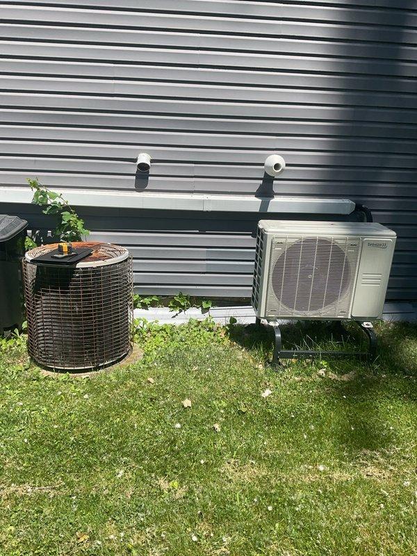 Completed comprehensive HVAC system evaluation for full equipment replacement at residential property. Assessment included existing outdoor mini-split heat pump condenser unit and indoor Amana air handler with associated ductwork, refrigerant lines, condensate drainage systems, and electrical connections. Documented current equipment condition, placement configurations, and mechanical room infrastructure to provide accurate replacement specifications and installation requirements.