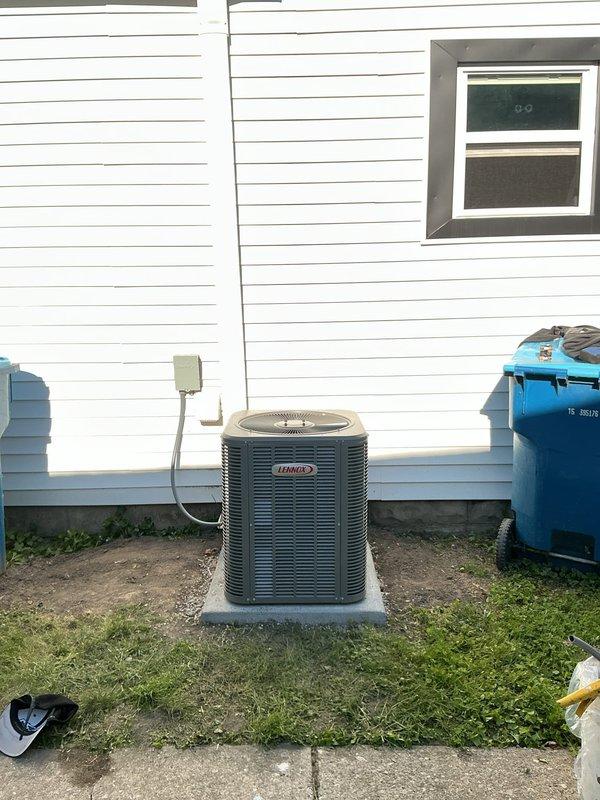 Completed full HVAC system installation including a 14 SEER, 2-ton single-stage Lennox condenser and 70,000 BTU downflow gas furnace with cased coil. Installed new copper line set routed through crawl space, removed existing line set from attic, and set condenser on new concrete pad with proper electrical disconnect and whip connection. Installed programmable thermostat to complete system commissioning and verified all components operating within manufacturer specifications.