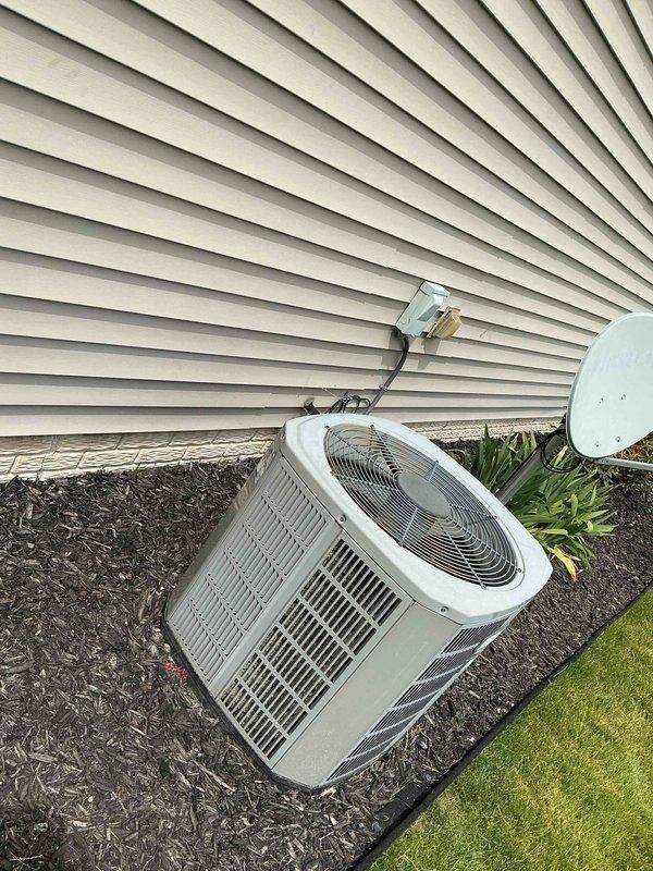 Performed comprehensive cooling maintenance on 14-year-old residential air conditioning system. Inspected outdoor condenser unit, verified proper electrical connections at disconnect box, checked refrigerant levels, cleaned condenser coils, and confirmed operational status of fan motor and compressor. Unit operating within normal parameters with no immediate repairs required.