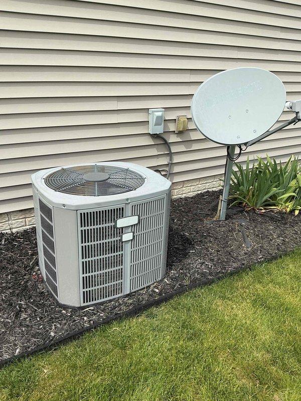 Performed comprehensive cooling maintenance on 14-year-old residential air conditioning system. Inspected outdoor condenser unit, verified proper electrical connections at disconnect box, checked refrigerant levels, cleaned condenser coils, and confirmed operational status of fan motor and compressor. Unit operating within normal parameters with no immediate repairs required.