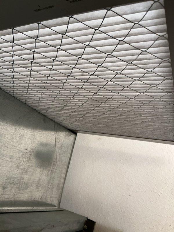 Completed routine cooling maintenance on an 18-year-old air conditioning system. Inspected outdoor condenser unit, verified heat exchanger coils and fins for proper condition, and examined indoor air handler components including insulation integrity. System operational and ready for continued service.