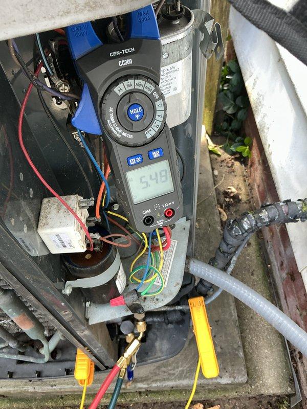 Performed comprehensive air conditioning tune-up on 7-year-old cooling system. Conducted electrical diagnostics using digital multimeter to test capacitor voltage and verify proper system operation, inspected all electrical connections and components including contactor and capacitor assembly, and confirmed all wiring connections were secure and functioning within manufacturer specifications.