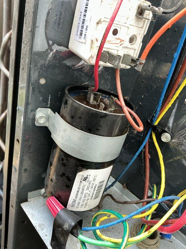 Performed comprehensive air conditioning tune-up on 7-year-old cooling system. Conducted electrical diagnostics using digital multimeter to test capacitor voltage and verify proper system operation, inspected all electrical connections and components including contactor and capacitor assembly, and confirmed all wiring connections were secure and functioning within manufacturer specifications.