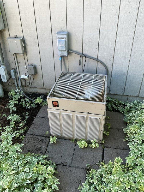 Completed annual maintenance on a 10-year-old residential air conditioning system. Performed standard tune-up procedures including inspection of outdoor condensing unit, verification of electrical connections at disconnect box and control panel, and assessment of refrigerant lines and condensate drainage system. Unit found to be operating within normal parameters with all components functioning properly.