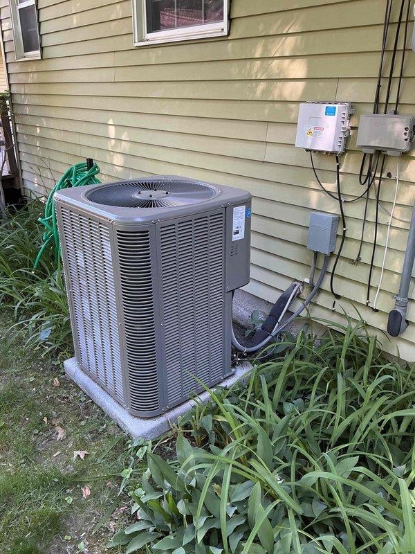 Completed routine maintenance on a 2-year-old residential air conditioning system. Performed standard tune-up procedures including inspection of the outdoor condenser unit, verification of electrical connections and disconnect functionality, and evaluation of the indoor Lennox furnace system with integrated humidifier. All components found operating within normal parameters with no immediate service needs identified.