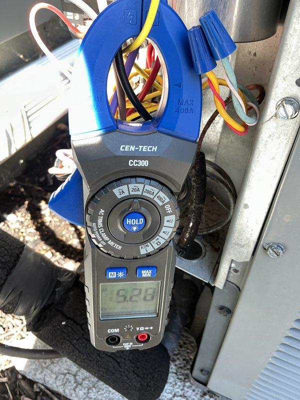 Completed scheduled HVAC maintenance service call on a 9-year-old air conditioning system. Performed system inspection, verified electrical disconnect switch operation, and measured operating amperage at 52.8 amps using clamp meter. Customer renewed maintenance plan agreement at time of service.