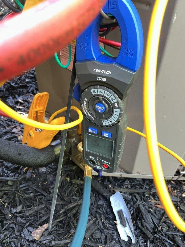 Completed MVP cooling maintenance on 20-year-old air conditioning system. Performed electrical diagnostics using clamp meter to verify amperage draw and system performance. Inspected condensate drain lines, PVC piping connections, and associated HVAC components to ensure proper operation and drainage function.
