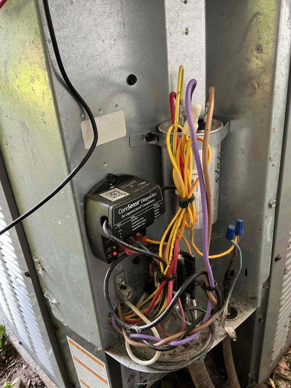 Completed MVP cooling maintenance on 8-year-old residential air conditioning system. Performed standard preventive maintenance inspection of outdoor condenser unit and electrical components, verified proper operation of relay and control wiring, and documented system condition with photos showing functional electrical compartment and properly installed exterior unit on concrete pad with adequate clearance.