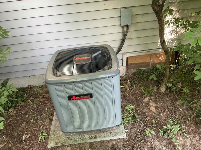 Completed MVP cooling maintenance on 8-year-old residential air conditioning system. Performed standard preventive maintenance inspection of outdoor condenser unit and electrical components, verified proper operation of relay and control wiring, and documented system condition with photos showing functional electrical compartment and properly installed exterior unit on concrete pad with adequate clearance.