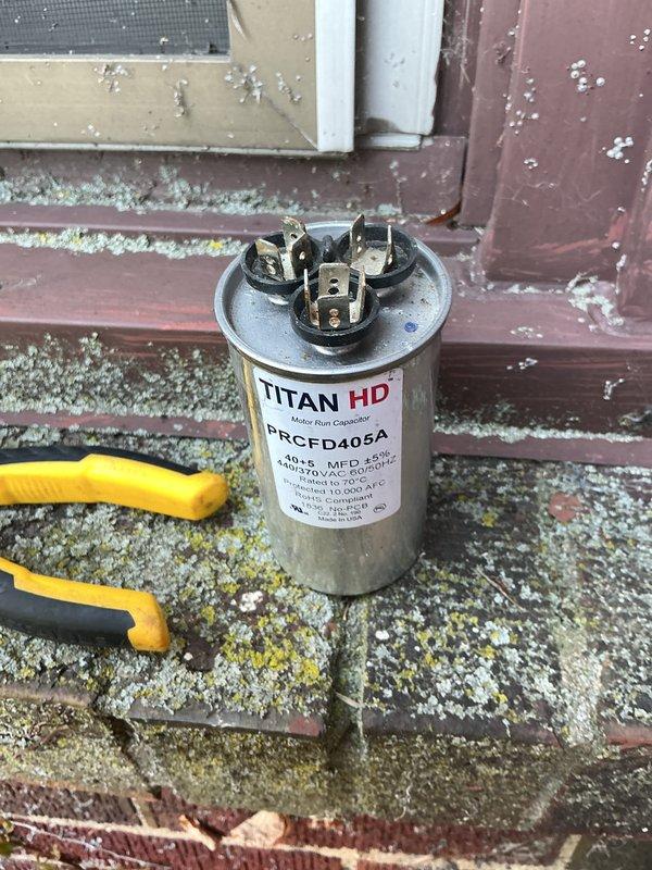 Completed scheduled maintenance on Lennox outdoor condensing unit. Performed comprehensive system inspection, cleaned condenser coils and surrounding area, and replaced TITAN HD capacitor (model PRCFD405A). Unit operational and cooling efficiently upon completion.