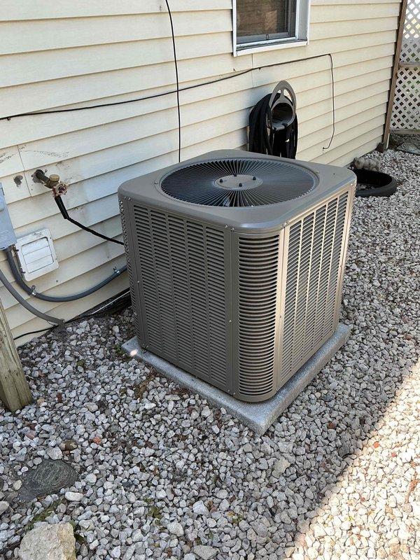 Responded to service call for unusual noise during AC operation. Performed diagnostic inspection of outdoor condenser unit and internal components. Removed access panel and inspected electrical connections, capacitor, and wiring harness - all found to be secure and properly routed. Verified condenser unit exterior condition, fan operation, and refrigerant line connections. Unit operating within normal parameters at time of inspection.