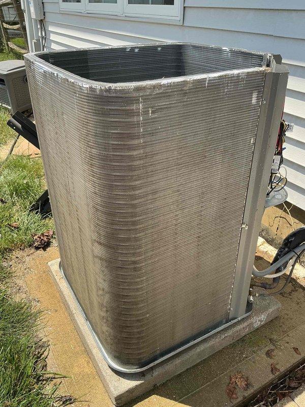 Responded to no-cooling call on 1-2 year old air conditioning system. Upon arrival, found outdoor condensing unit heavily covered in dirt, dust, and debris accumulation, restricting airflow through exterior coil surfaces. Inspected electrical connections and verified unit would not start due to excessive buildup affecting proper operation. Thoroughly cleaned condenser coil and exterior surfaces, removing environmental debris that had accumulated on cabinet and coil fins. Restored power to unit, verified compressor and fan motor operation, and confirmed system returned to normal cooling function. Unit now operating properly with adequate airflow restored.
