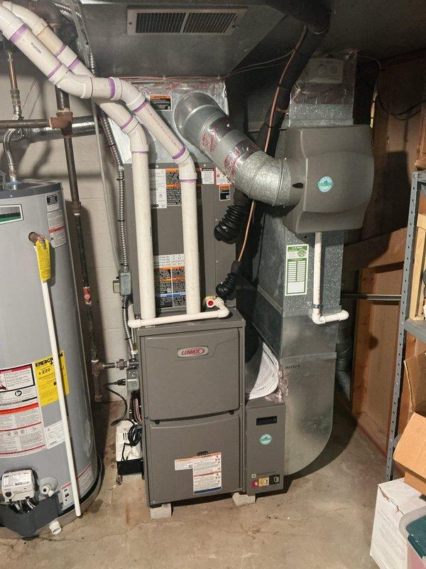 Returned to complete HVAC installation by installing add-a-line set, repairing condensate drain system, and performing comprehensive furnace gas pressure checks. Successfully started up air conditioning system, replaced condensate pump, and verified proper operation of both heating and cooling equipment with outdoor condenser unit and indoor Lennox furnace functioning within manufacturer specifications.