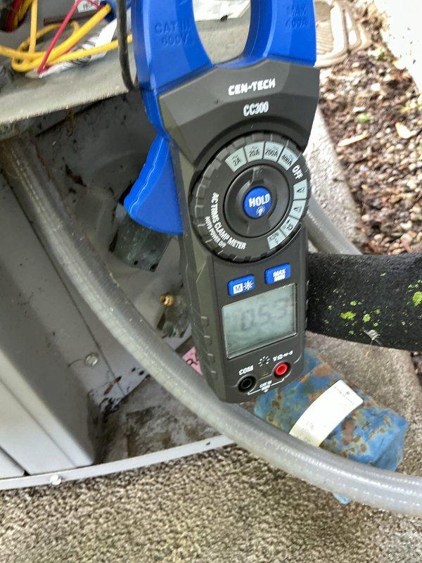 Performed seasonal maintenance on Armstrong air conditioning condenser unit. Completed comprehensive system inspection including electrical measurements with diagnostic clamp meter, verified proper amperage draw, cleaned condenser coils, and confirmed unit operational status with all components functioning within manufacturer specifications.