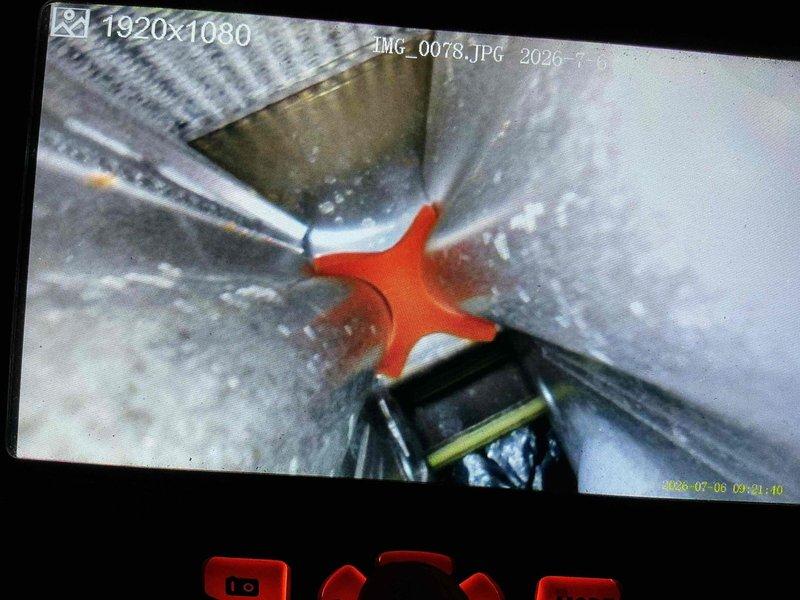 Performed scheduled maintenance on 5-year-old air conditioning system. Conducted thorough inspection of ductwork system using borescope camera equipment to assess interior conditions and verify proper connections at junction points. All ductwork connections and flexible duct sections were examined and found to be secure with no visible air leakage or separation at seams.