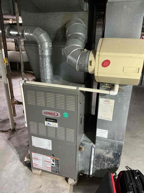Responded to no-heat call for Lennox furnace that would not ignite. Upon inspection, accessed unit and evaluated burner assembly, flame sensor, igniter components, and gas valve operation. Examined control board wiring and electrical connections throughout system. Diagnosed ignition failure and performed necessary repairs to restore proper furnace operation and heat to residence.