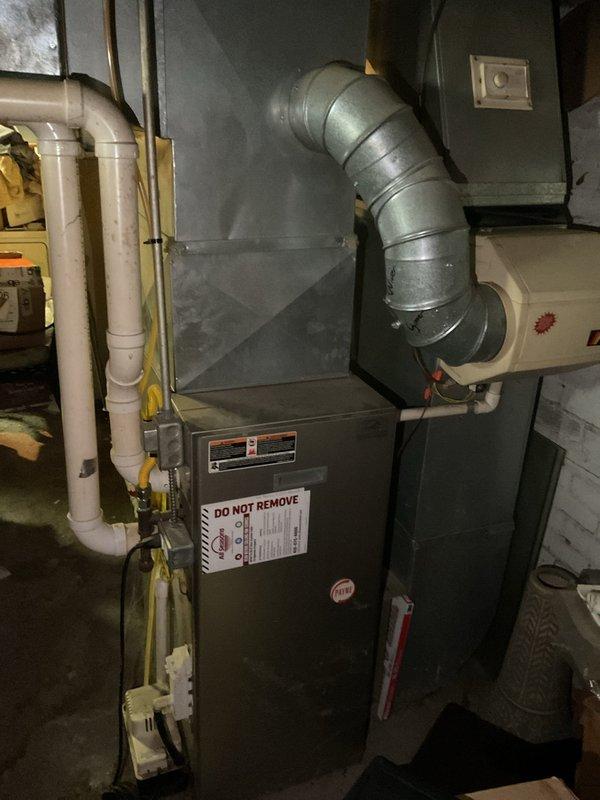 Conducted comprehensive assessment of existing HVAC system in residential basement for complete air conditioning replacement. Evaluated current furnace configuration, ductwork connections, electrical panel capacity, and existing infrastructure including PVC condensate drainage system. Documented equipment specifications, electrical requirements, and spatial constraints to develop accurate replacement proposal for new AC system installation.