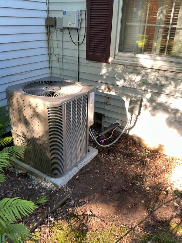 # Complete HVAC System Replacement

Removed and replaced aging Lennox Pulse furnace with new 96% AFUE upflow gas furnace. Installed matching upflow cased evaporator coil with 5-inch filter rack for improved air filtration. Added 17-gallon whole-home humidifier with metal construction for enhanced indoor air quality control.

Replaced outdoor condensing unit on new concrete equipment pad with proper elevation and drainage. Installed new refrigerant lineset connecting outdoor condenser to indoor evaporator coil, ensuring proper insulation and routing along exterior wall. Ran new electrical whip and installed dedicated disconnect box at outdoor unit per code requirements.

Upgraded system controls with new programmable thermostat for improved temperature management and energy efficiency. Verified proper refrigerant charge, airflow, and system operation. Ensured all electrical connections meet current code standards. Leveled equipment and confirmed proper condensate drainage. System tested