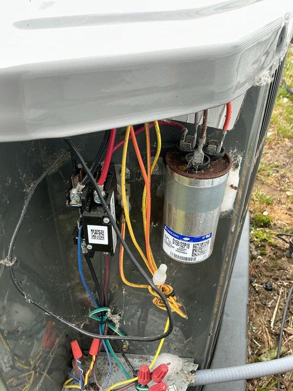 Completed routine AC tune-up on 5-year-old system. Performed visual inspection of outdoor condensing unit, verified electrical connections at capacitor and contactor, and documented equipment condition with photos. All components operating within normal parameters.