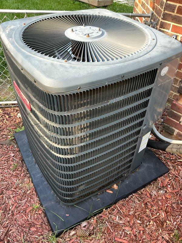 Completed routine maintenance on residential air conditioning system. Inspected outdoor condenser unit, verified fan operation, checked electrical connections at disconnect box, and confirmed system functionality. Unit operational with no immediate issues identified.