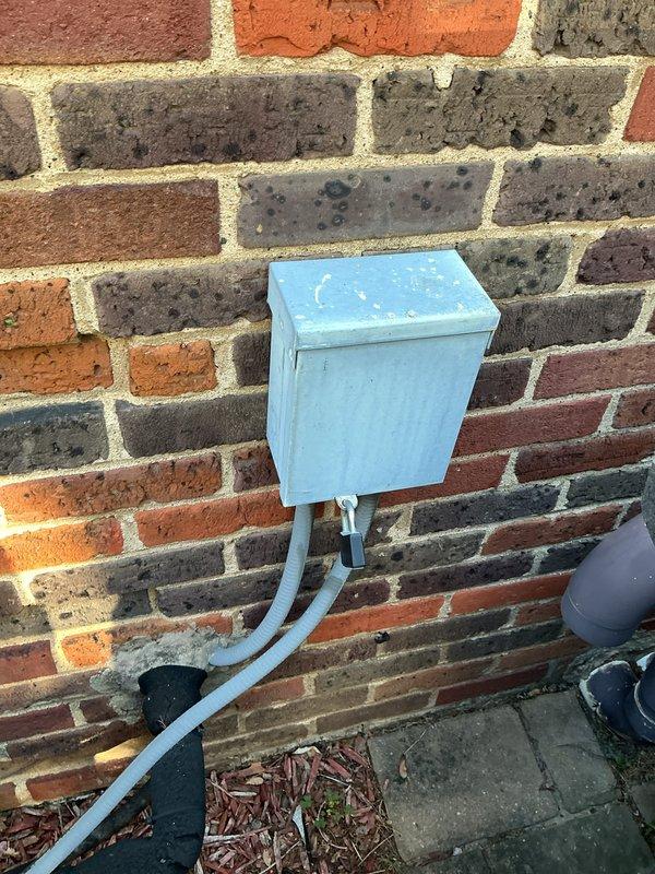 Completed routine maintenance on residential air conditioning system. Inspected outdoor condenser unit, verified fan operation, checked electrical connections at disconnect box, and confirmed system functionality. Unit operational with no immediate issues identified.