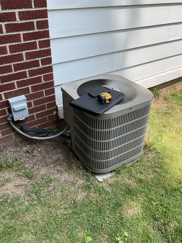 Completed comprehensive estimate for full HVAC system replacement at residential property. Evaluated existing Lennox furnace and indoor air handler located in basement utility area, along with outdoor condenser unit positioned on concrete pad adjacent to home exterior. Assessed current system configuration including ductwork connections, PVC venting, electrical disconnect, and refrigerant line sets to determine replacement specifications and equipment requirements for new installation.
