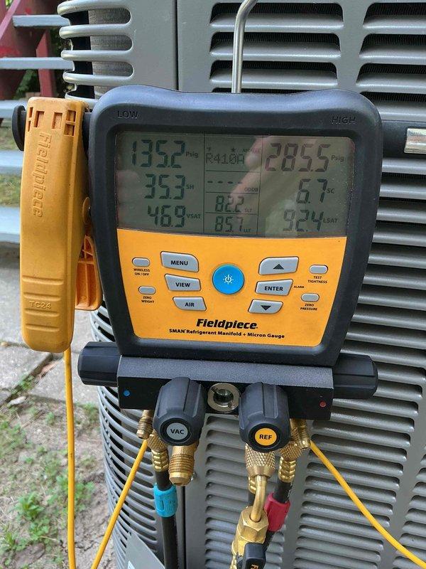 Responded to no cooling call on 2-year-old R410A system. Diagnosed failed fuses in outdoor unit, which were replaced under parts warranty. Performed system verification using manifold gauges, confirmed proper pressures and temperatures, and restored cooling operation.