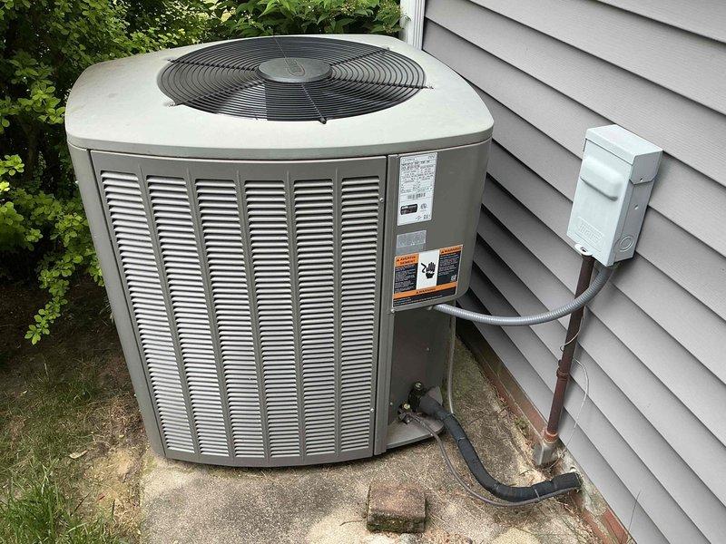 Performed annual maintenance on 13-year-old residential air conditioning system. Completed standard tune-up procedures including inspection of outdoor condenser unit, verification of electrical components, and assessment of dual run capacitors. Unit found in normal operating condition with age-appropriate wear, all components functioning within specifications.