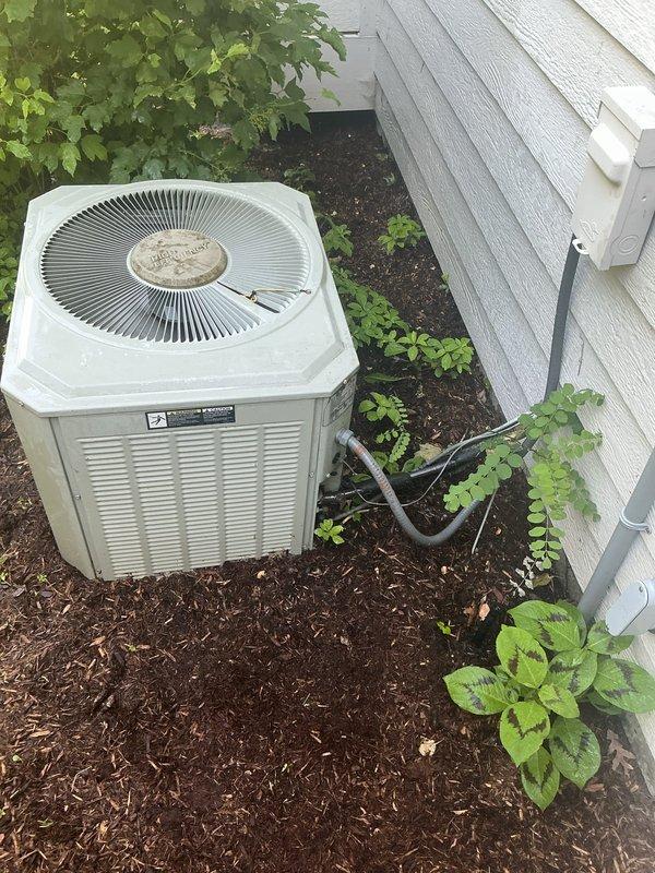 Responded to service call back for AC unit not cooling after previous freeze-up repair. Upon arrival, confirmed outdoor condensing unit operational but system still failing to produce cold air despite recent filter replacement. Conducted comprehensive diagnostic inspection of both outdoor unit and indoor air handler components in basement mechanical space. Identified underlying refrigerant system issue causing continued performance problems beyond initial frozen coil condition. Performed necessary repairs to restore proper cooling operation and verified system functionality before departure.