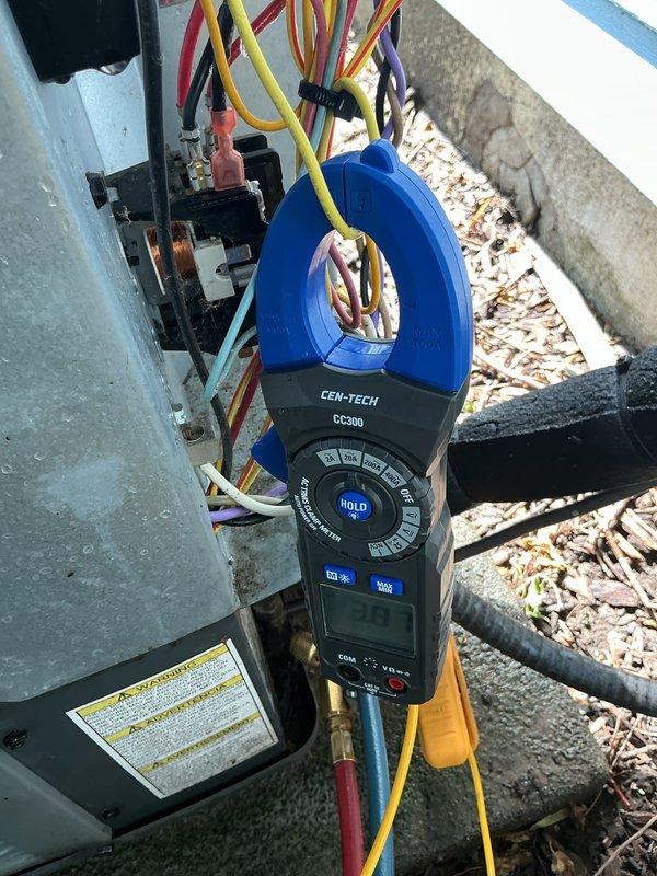 Completed scheduled cooling maintenance on 8-year-old MVP system. Performed electrical diagnostics using clamp meter to verify proper amperage draw and system performance. Inspected outdoor condensing unit, electrical connections, and disconnect box. All components operating within manufacturer specifications. System tested and confirmed cooling properly.