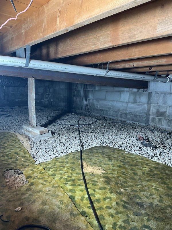 Completed installation correction call back for AC and furnace system. Installed condensate pump to redirect drainage from ground discharge to approved location per code requirements. Secured 2-inch PVC piping with straps at proper 4-foot intervals throughout the run to meet installation standards.