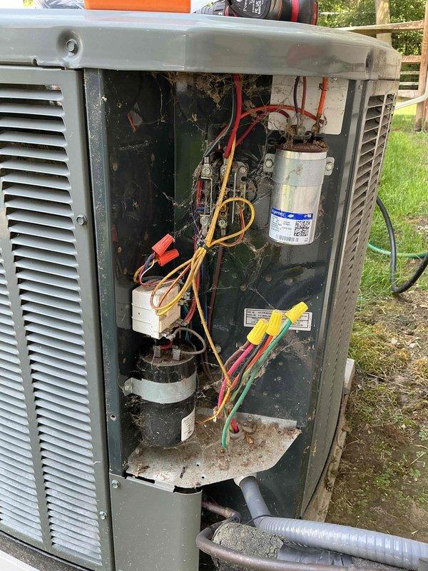 Responded to no cooling complaint on 14-year-old air conditioning system. Upon inspection, found failed dual-run capacitor causing compressor to hard-start and produce abnormal noise. Replaced defective capacitor with properly rated unit, verified all electrical connections, and tested system operation. Unit now cooling properly with compressor running quietly and efficiently.