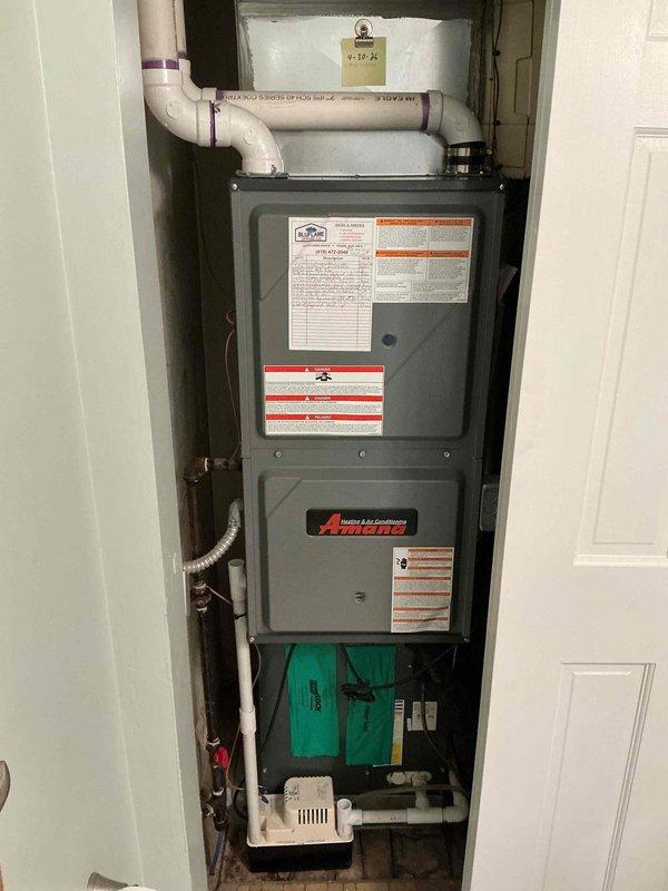 Completed preventative maintenance on 6-year-old Amana air conditioning system. Performed standard tune-up procedures including inspection of indoor furnace unit and outdoor condensing unit, verified electrical connections and capacitor operation, checked CoreSense diagnostic monitor functionality, and confirmed all components operating within normal parameters.